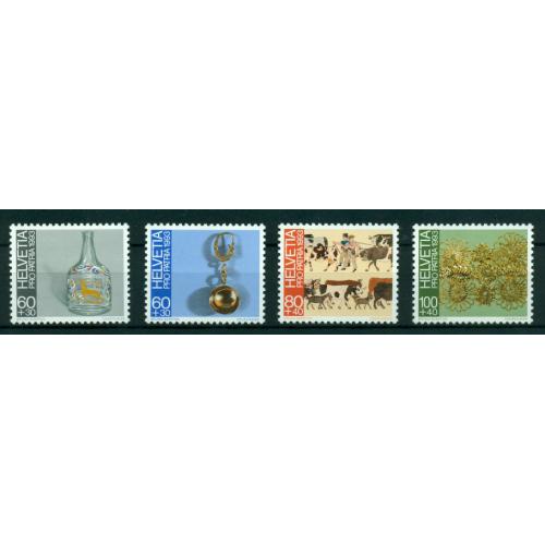 4 timbres neufs** de SUISSE. Art populaire de 1993