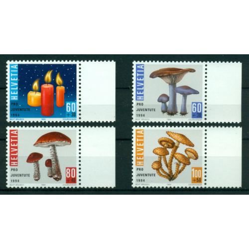 4 timbres neufs** de SUISSE. Noël et champignons de 1994