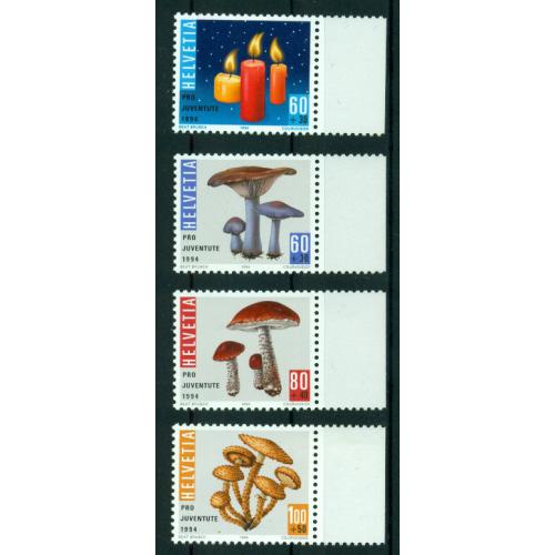 4 timbres neufs** de SUISSE de 1994. Noël et champignons